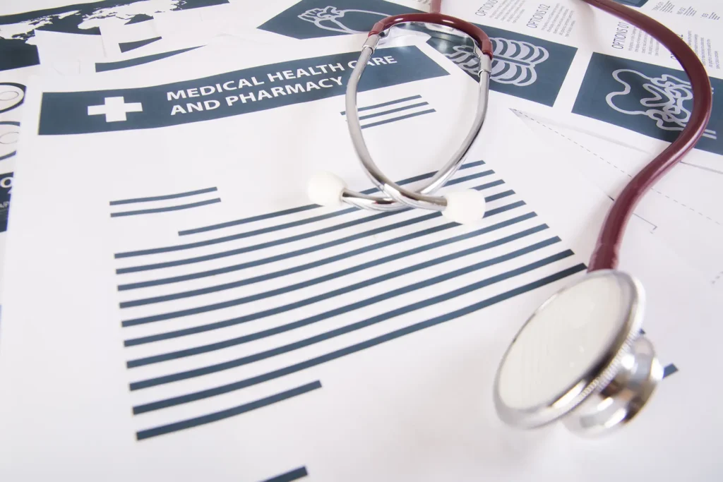 medical records report and stethoscope