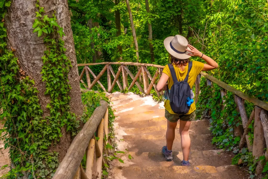 female tourist walking down stairs