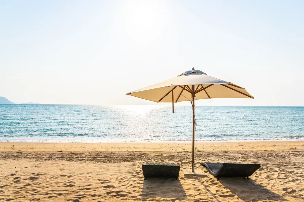 chair umbrella and lounge on the beautiful beach in florida